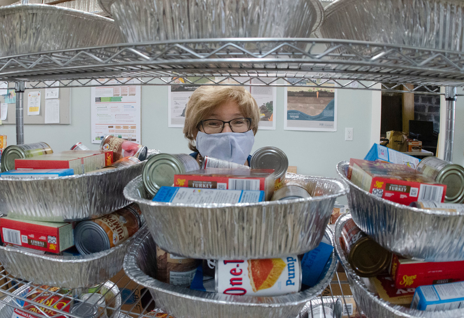 Amy Stubblefield prepares Thanksgiving Day food tins.