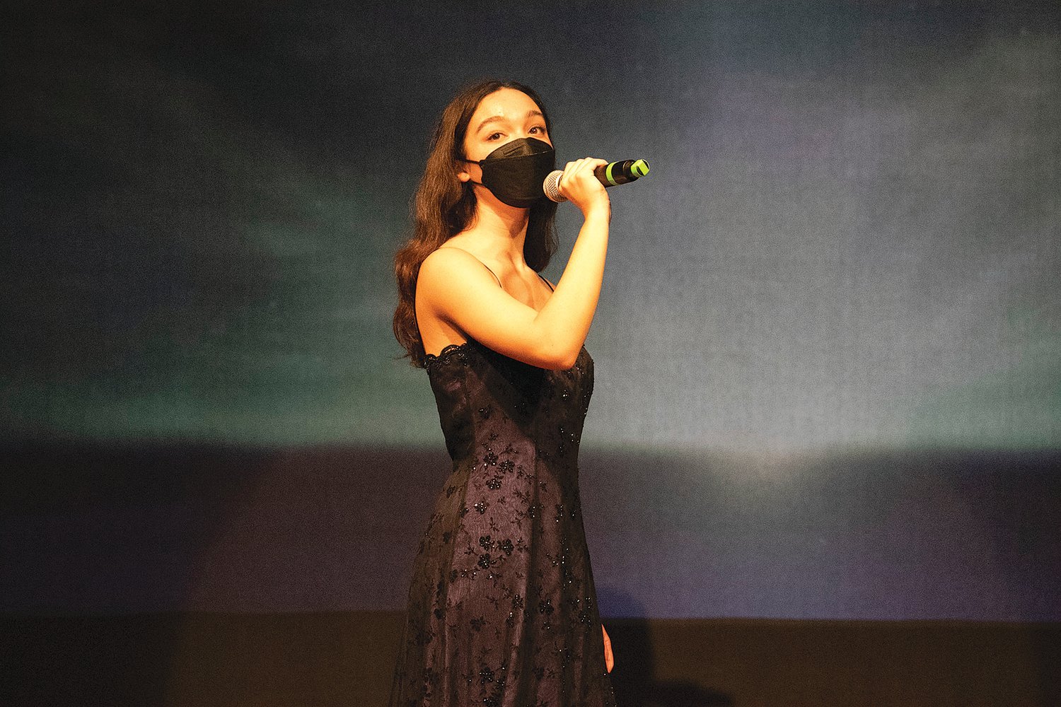 In Barrington High School’s version of the masked singer, Isabel Denise sings “Meadowlark” during a Stagemasters performance last week.