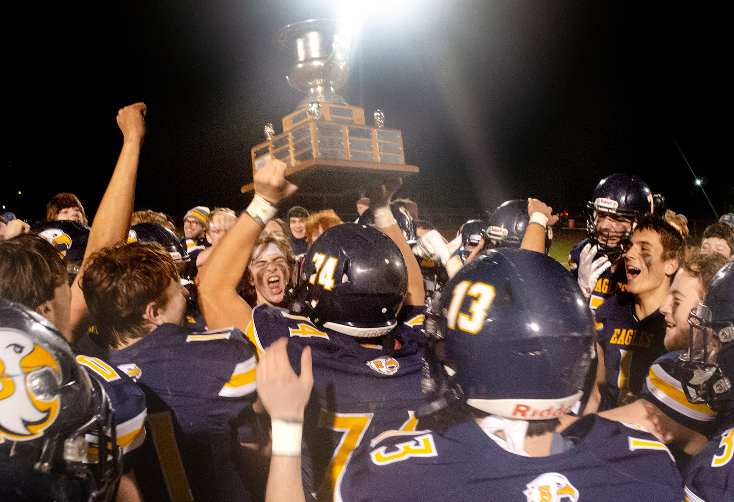 The Eagles hoist the trophy after the Thanksgiving Day game, played on Thursday night.