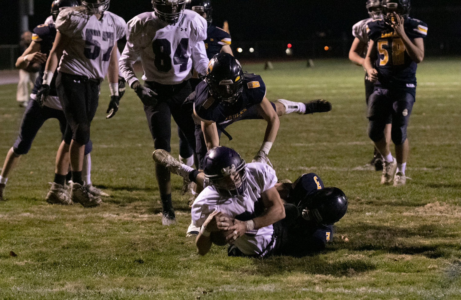 Huskies running back Nikolas DaSilva heads for the end zone, but is stopped short on the one yard line.