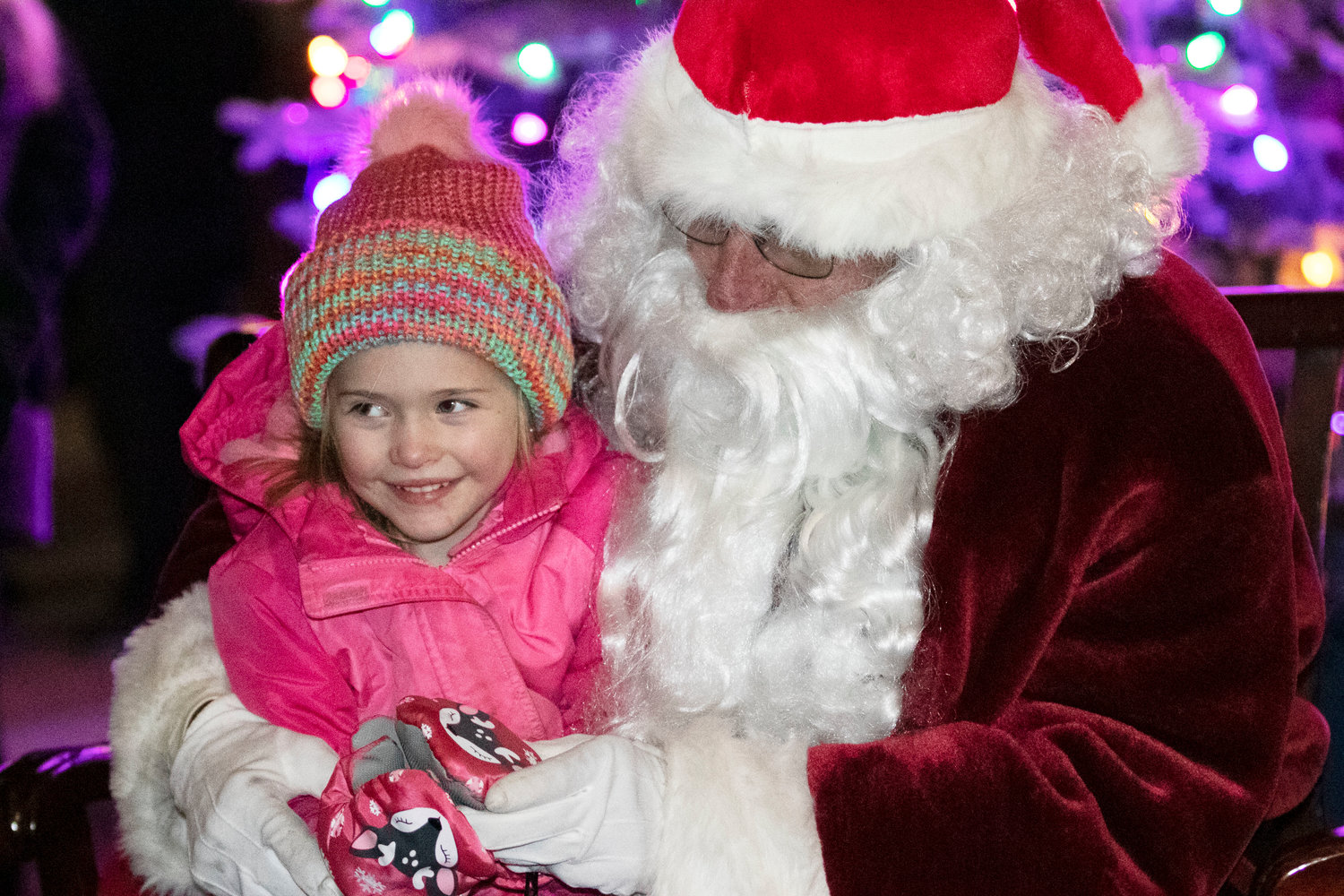 Emma Venagro shares a laugh with Santa at the 2021 East Providence City Hall Tree Lighting ceremony.