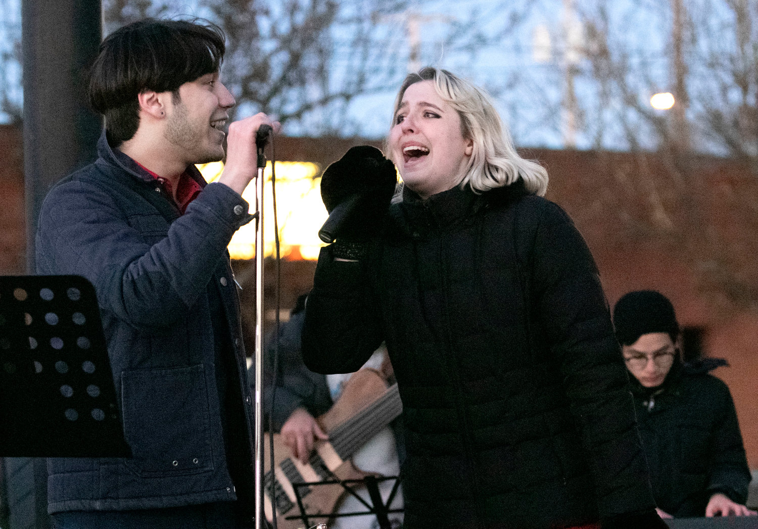 Donovan DaSilva (left), Natalie Dueck and the Berkley Caf Club sing and play jazzy holiday songs  at the 2021 East Providence City Hall Tree Lighting ceremony.