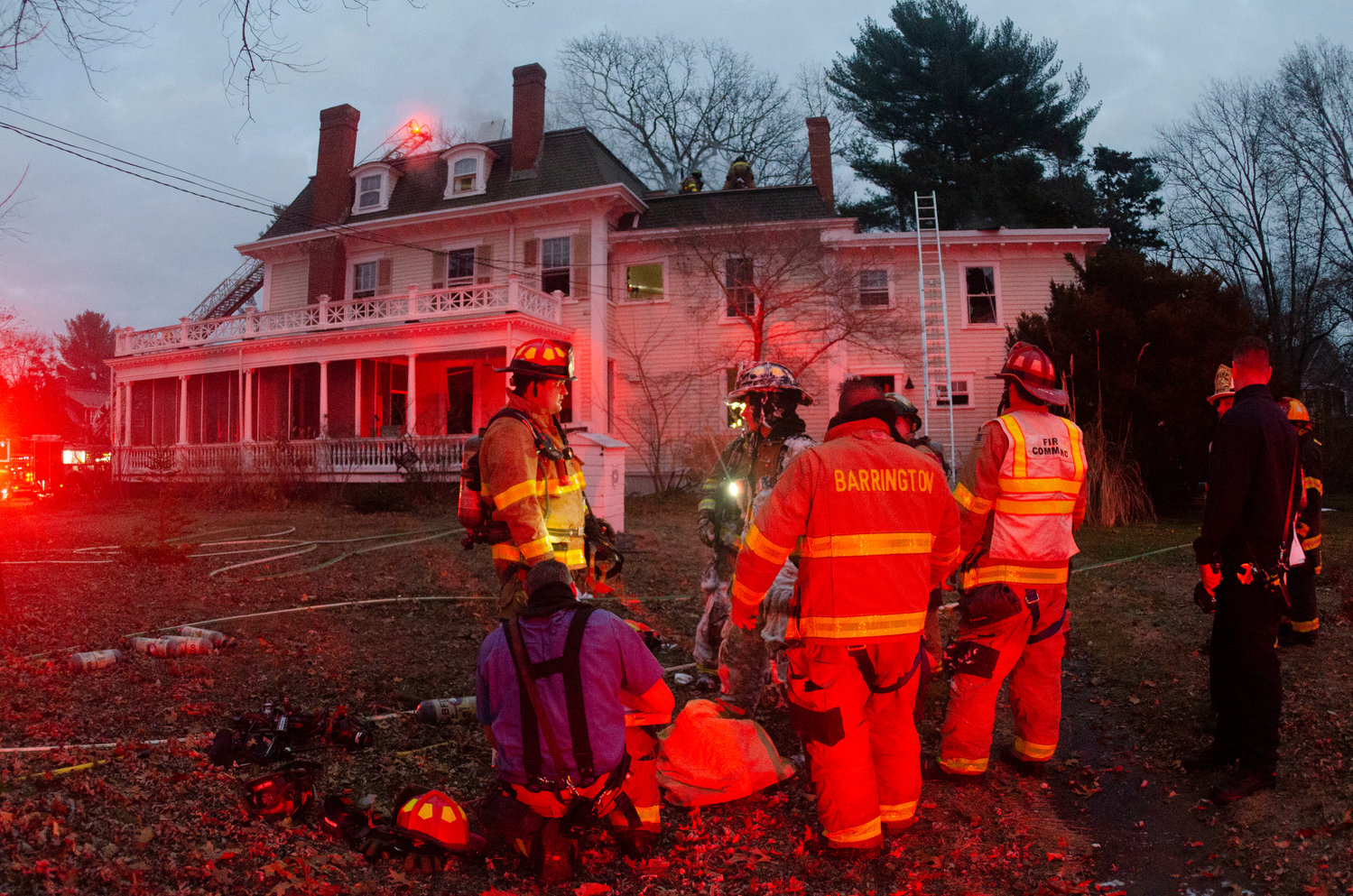 Firefighters battle a blaze at a large historic home in Barrington late Saturday afternoon.