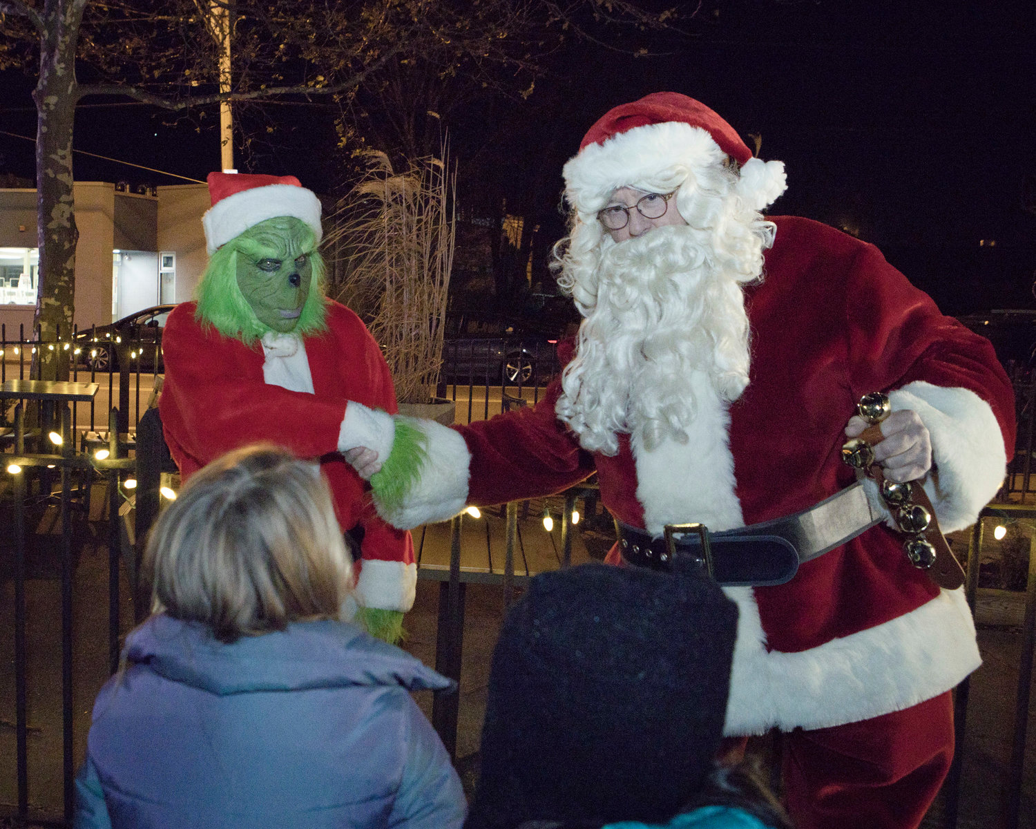 Santa makes a peace offering with the “Grinch” during the Riverside Renaissance MovementTree Lighting, Friday, Dec. 3.