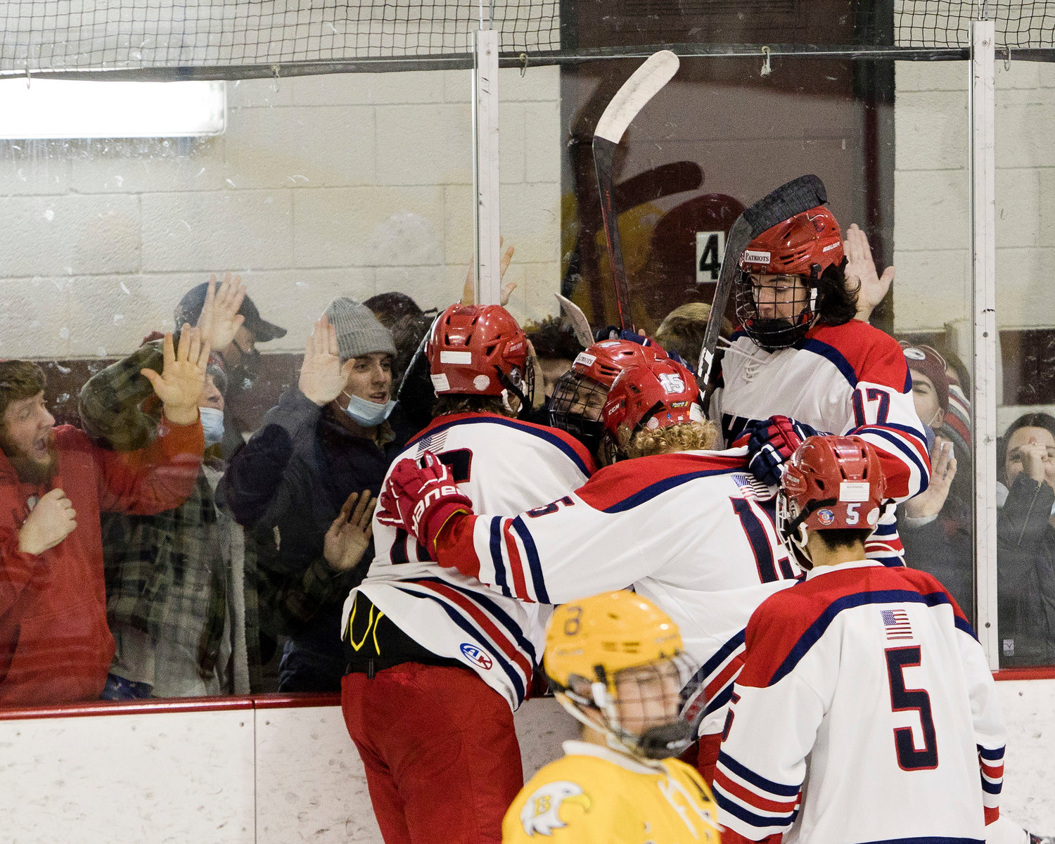 The Portsmouth Patriots celebrate a goal during the first half of Sunday's Injury Fund game against Barrington at Portsmouth Abbey. PHS won, 3-2.