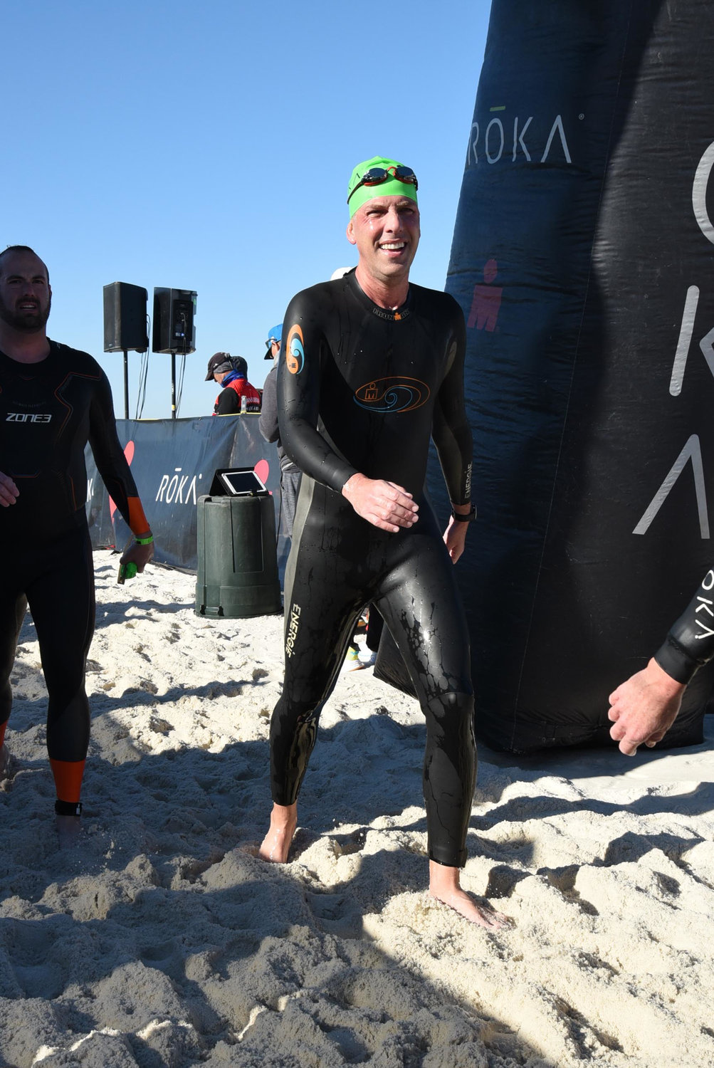 Mark Tracy finishes the swim portion of Ironman Florida. The Barrington resident said countless competitors were pulled from the water for taking too long to complete the swim.