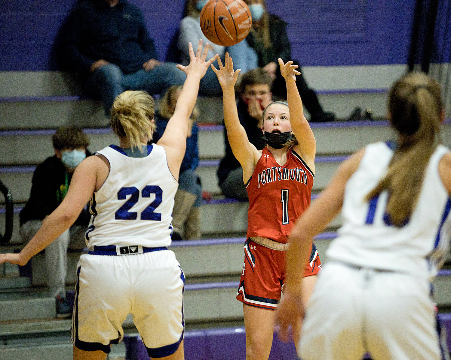 The Patriots’ Keira Rogers makes a shot over Mt. Hope opponents.