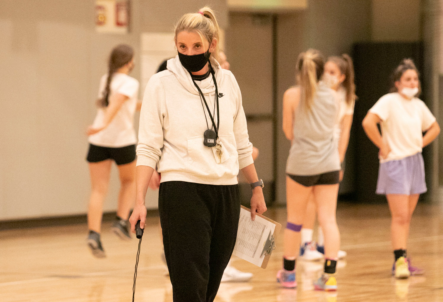 Girls basketball head coach Jen Gargiulo looks on during tryouts on Tuesday night.