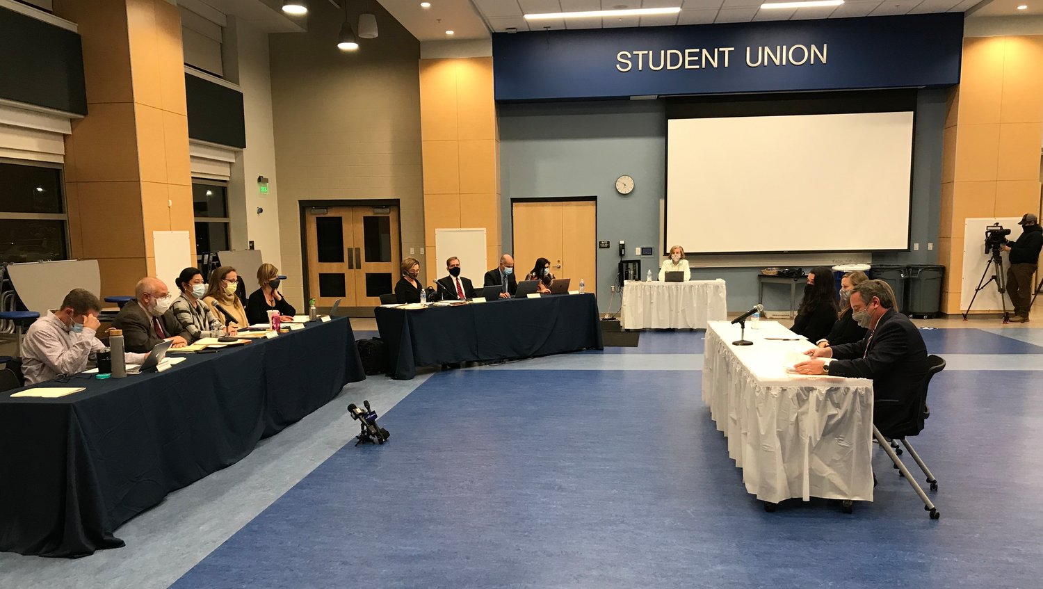 School officials are postponing the appeal hearing for three teachers who were suspended in late October. Shown is the pre-termination hearing on Oct. 28.
