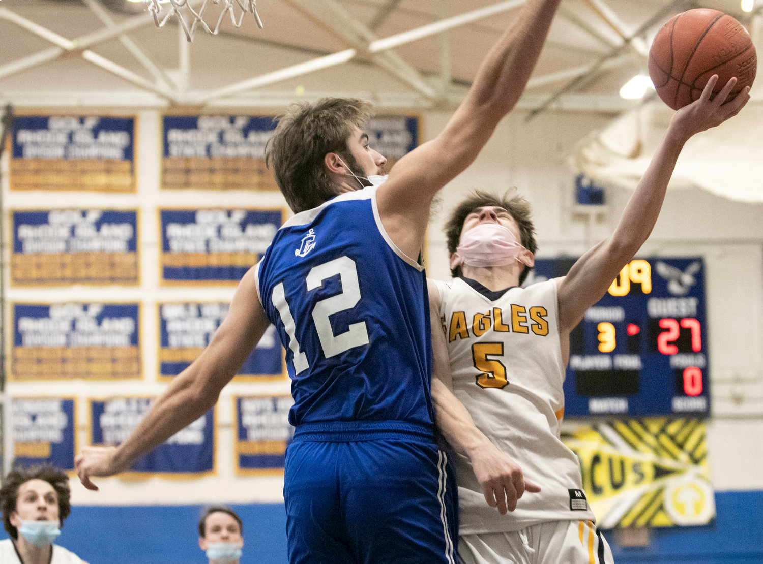 Matt Raffa drives to the basket for a layup late in the second half.