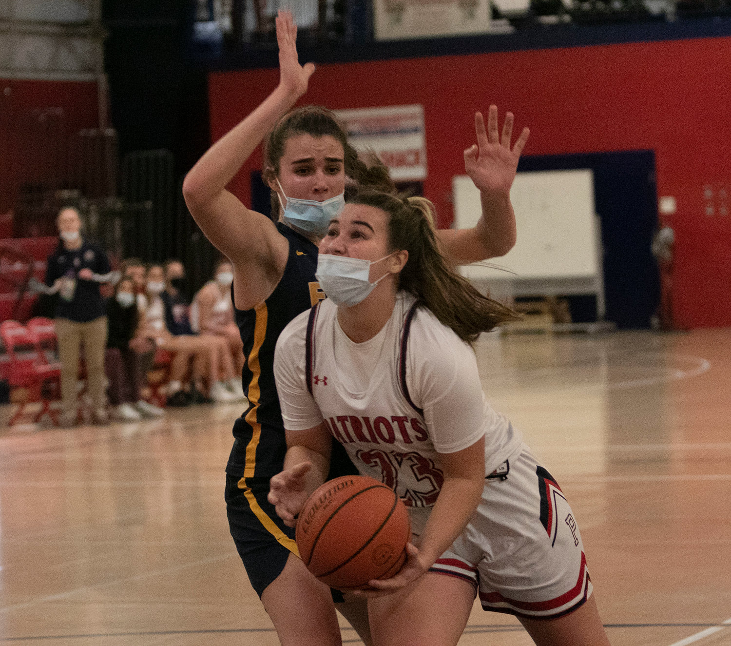 Emily Maiato looks to shoot from under the hoop.