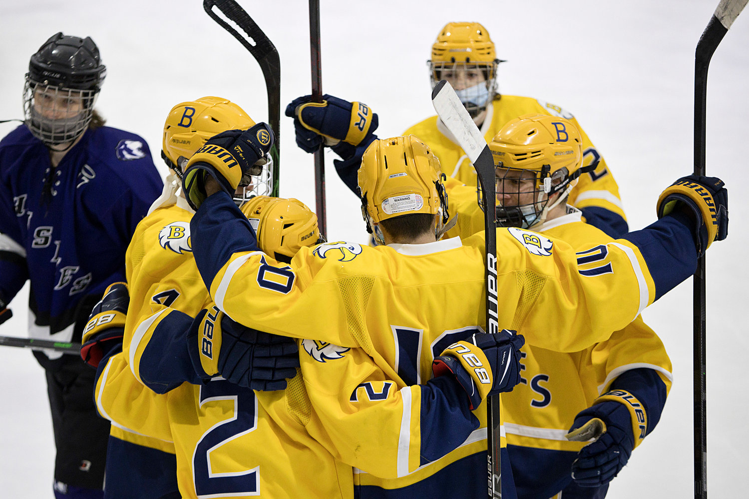 The Eagles celebrate a goal against the Huskies on Wednesday night, Jan. 5.