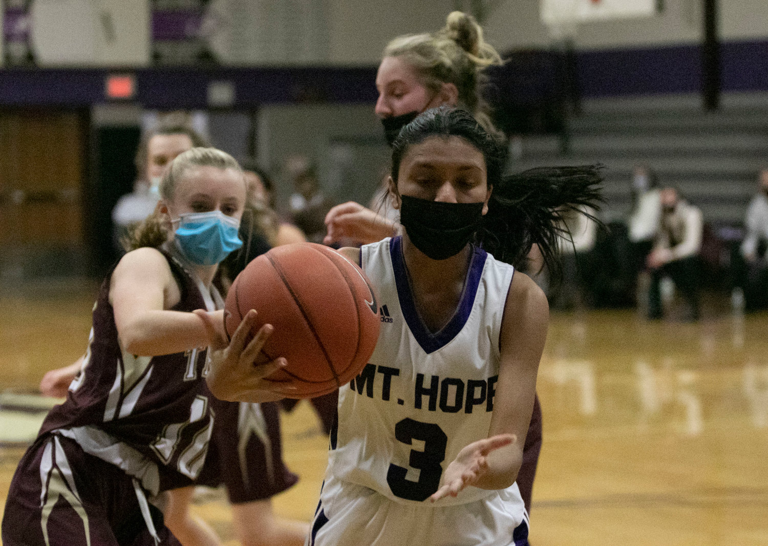 Aditi Mehta saves a Huskies possession and grabs the ball before it heads out of bounds.