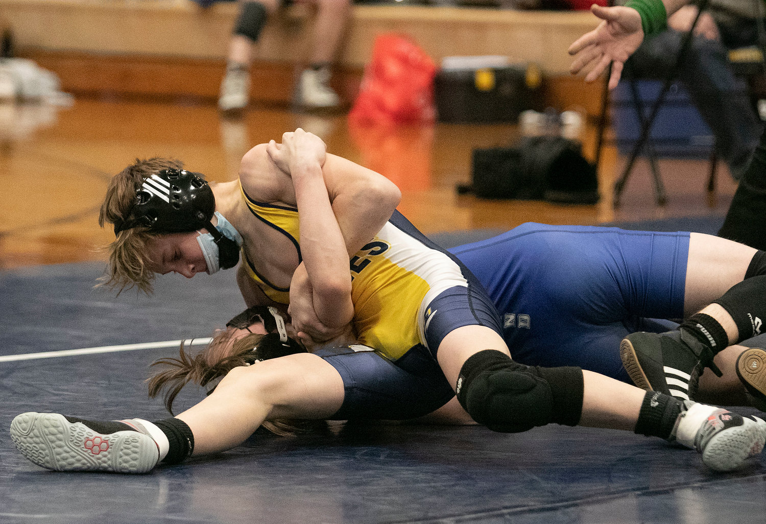 Barrington High School’s Kevin Robinson controls his Cumberland opponent en route to a victory last week.