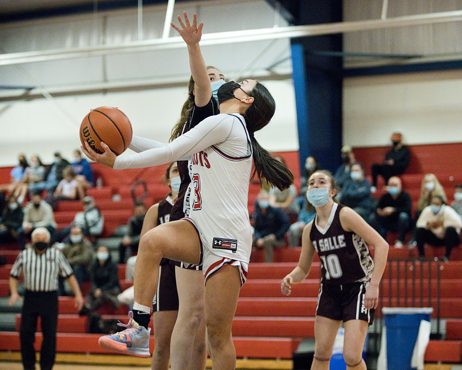 Olivia Durant goes in for a reverse layup during the first half of Friday's game against La Salle.