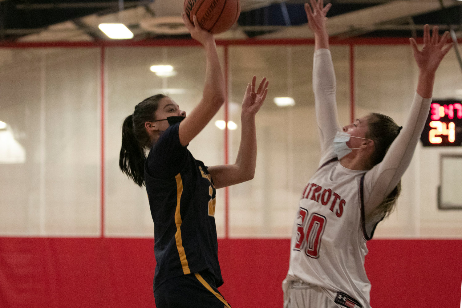 Barrington’s Caroline McConaghy drives in for a jumper during a game against Portsmouth in early January.
