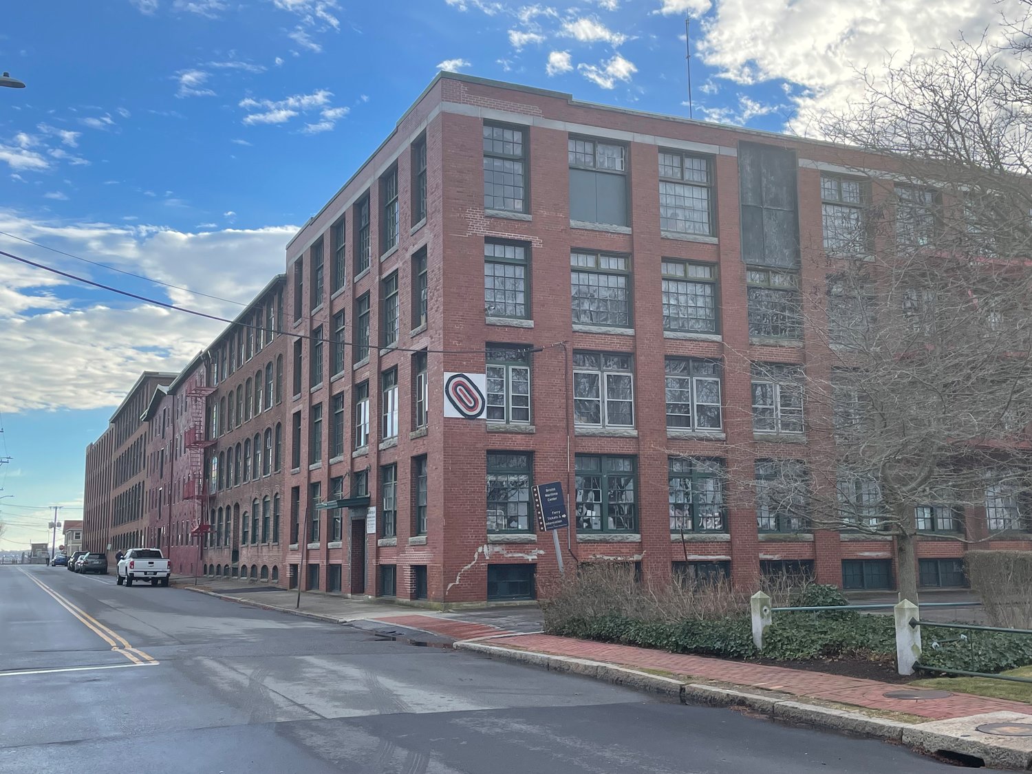 A number used to assess how many units can be built at the former Robin Rug mill building is being contested by advocates who say it includes space within the footprint that cannot be built upon or altered.
