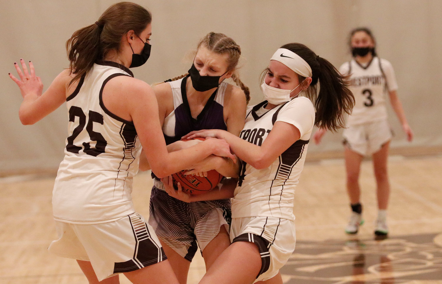 Senior forward Lily Pichette and junior guard Leah Sylvain combine on a steal against Bourne this season. Sylvain led the team with 89 steals this season. 