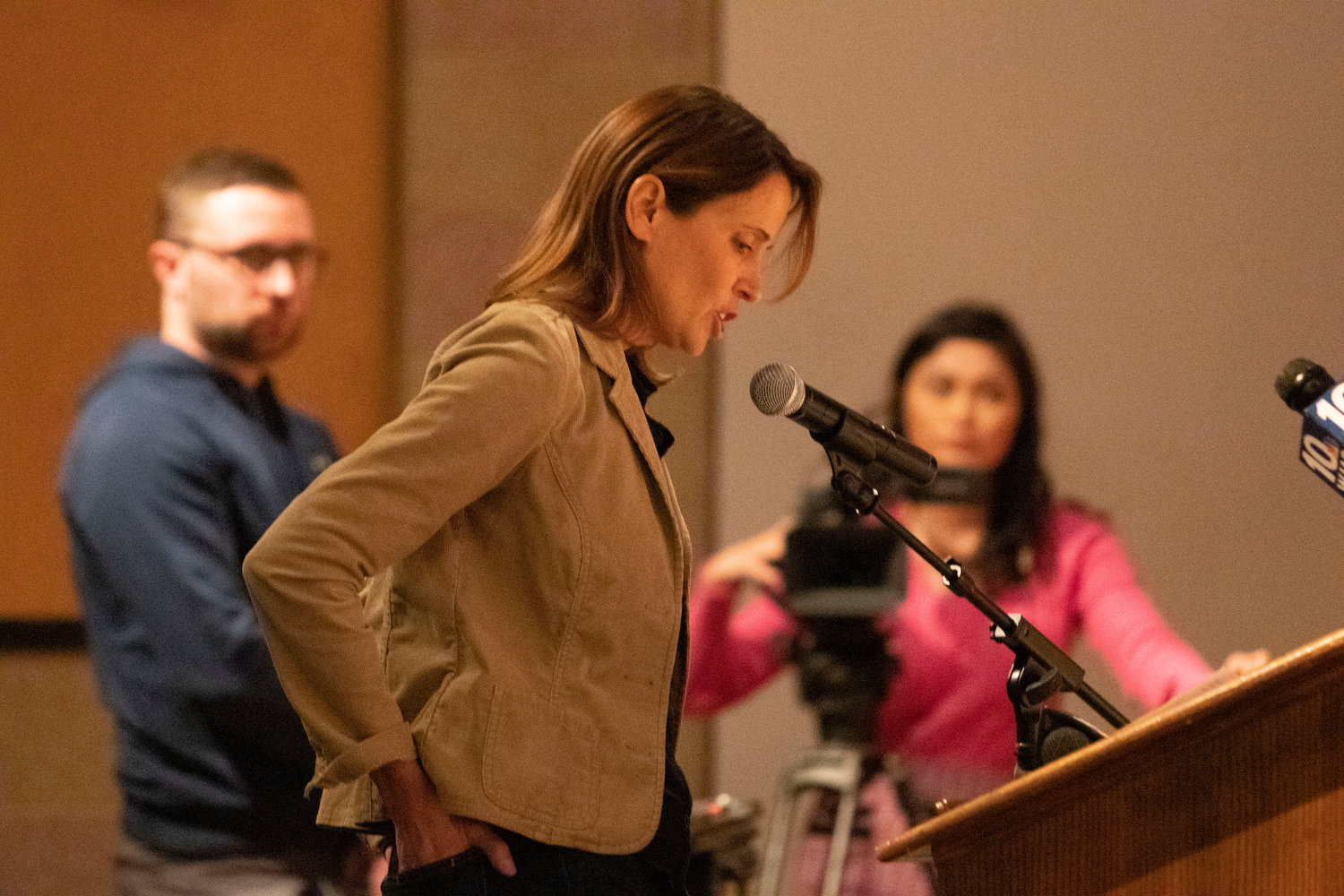 Julie Owens reads a statement to school officials during Wednesday night’s meeting at the BHS auditorium. Owens said the district’s problems are a “self-inflicted wound” and could have been avoided if officials just listened to the lived experiences of parents and students.