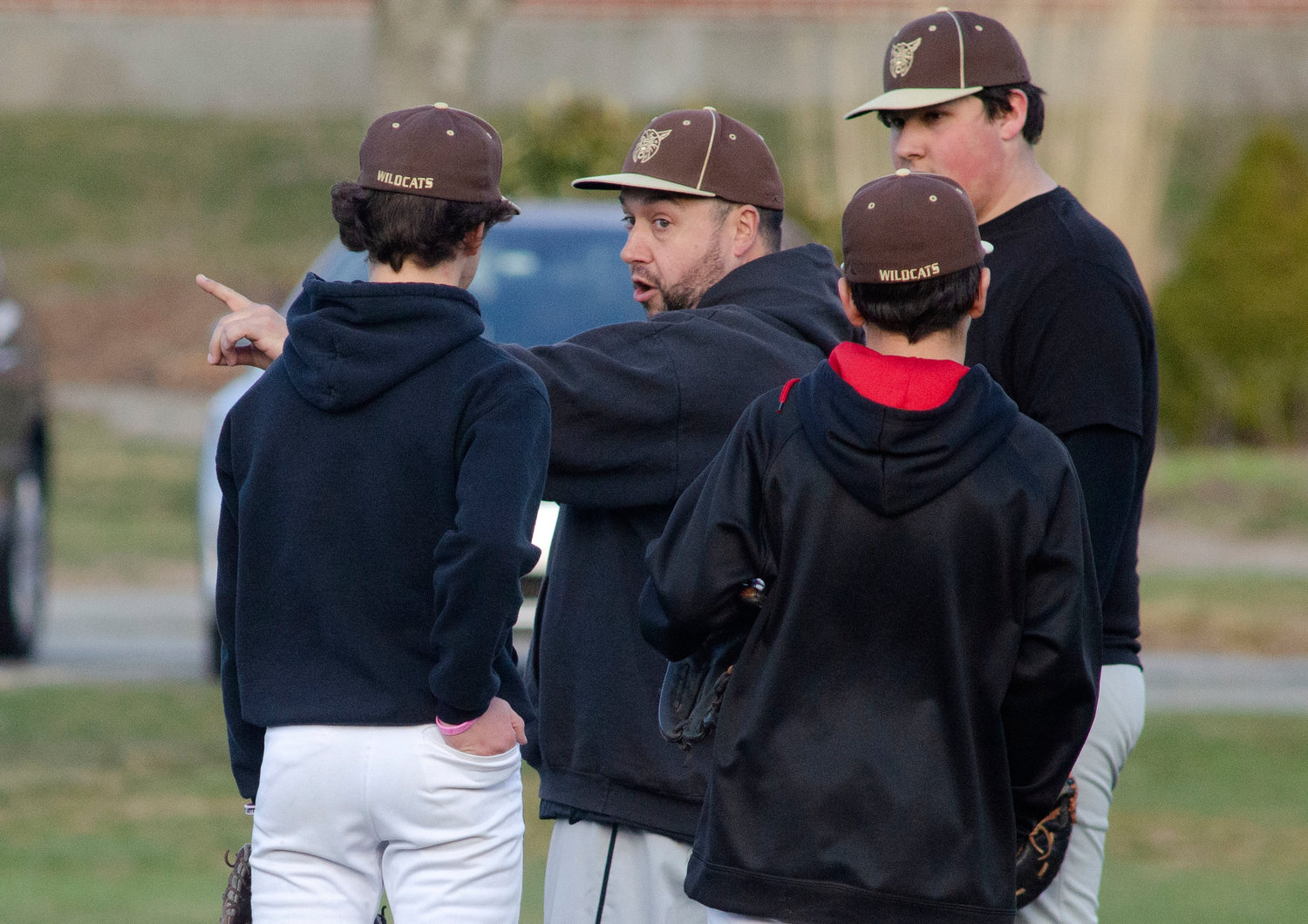 Westport head coach Jason Pacheco speaks to his young infielders during a scrimmage game against Tiverton on Wednesday. The Wildcats who went 8-3 last season, start the 2022 season schedule on Tuesday at Case High School.