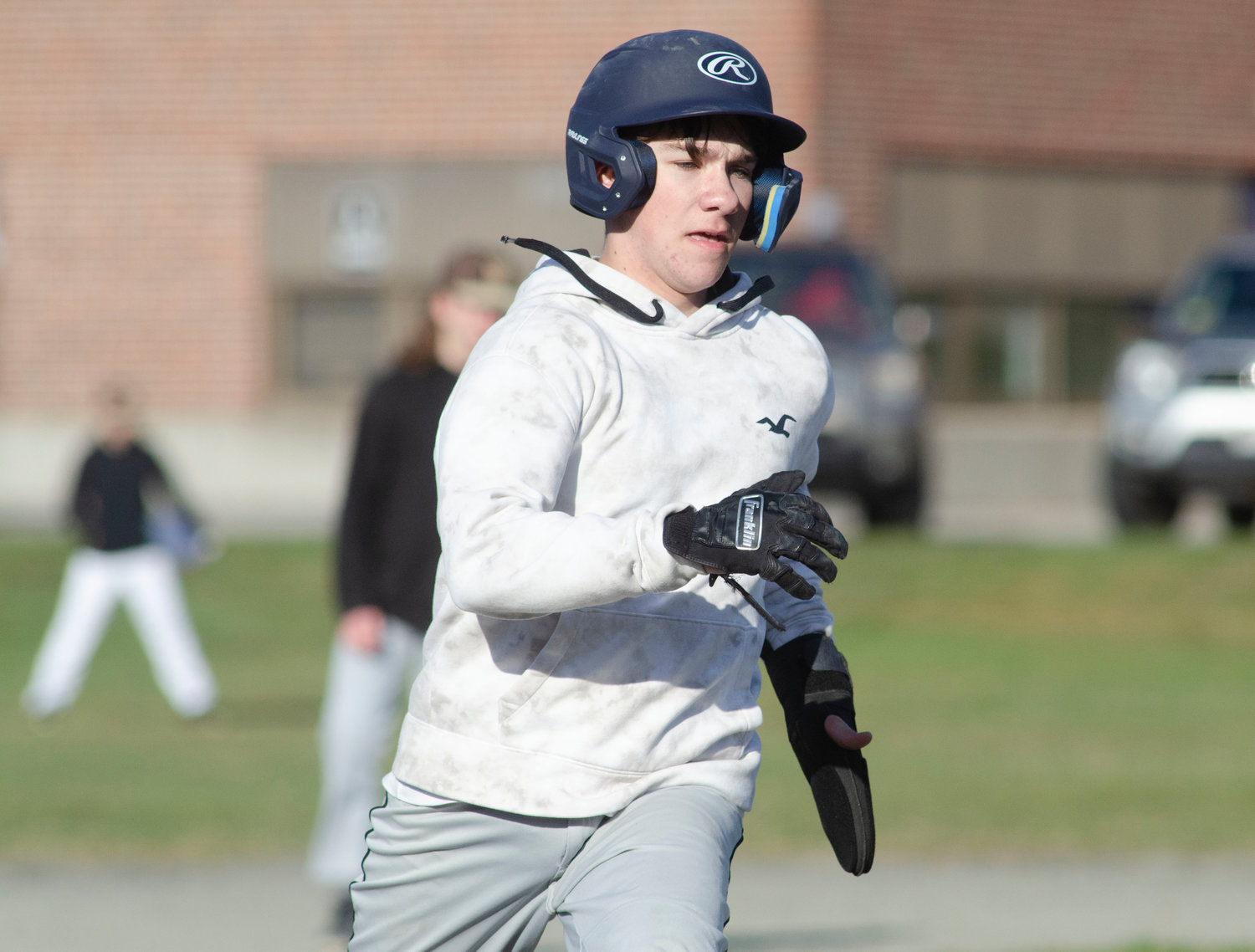 Sophomore shortstop Cam Rego heads for third base after smashing a ball over the center fielder’s head during the team’s scrimmage game against Westport on Wednesday.