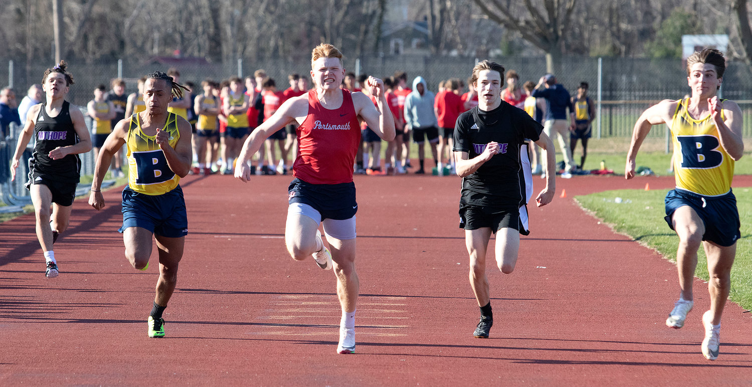 The Patriots Colby Farney (center) narrowly lost the 100-meter dash to Barrington’s Nate Greenberg (far right), but came out on top in the 200-meter dash, the long jump and the triple jump.