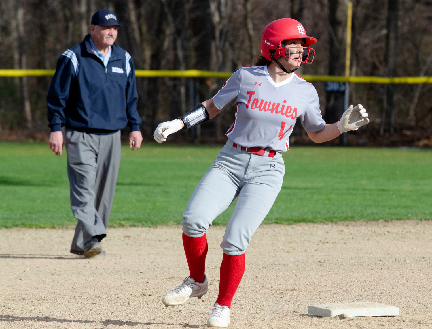 Sophia Patterson puts on the brakes at second base.