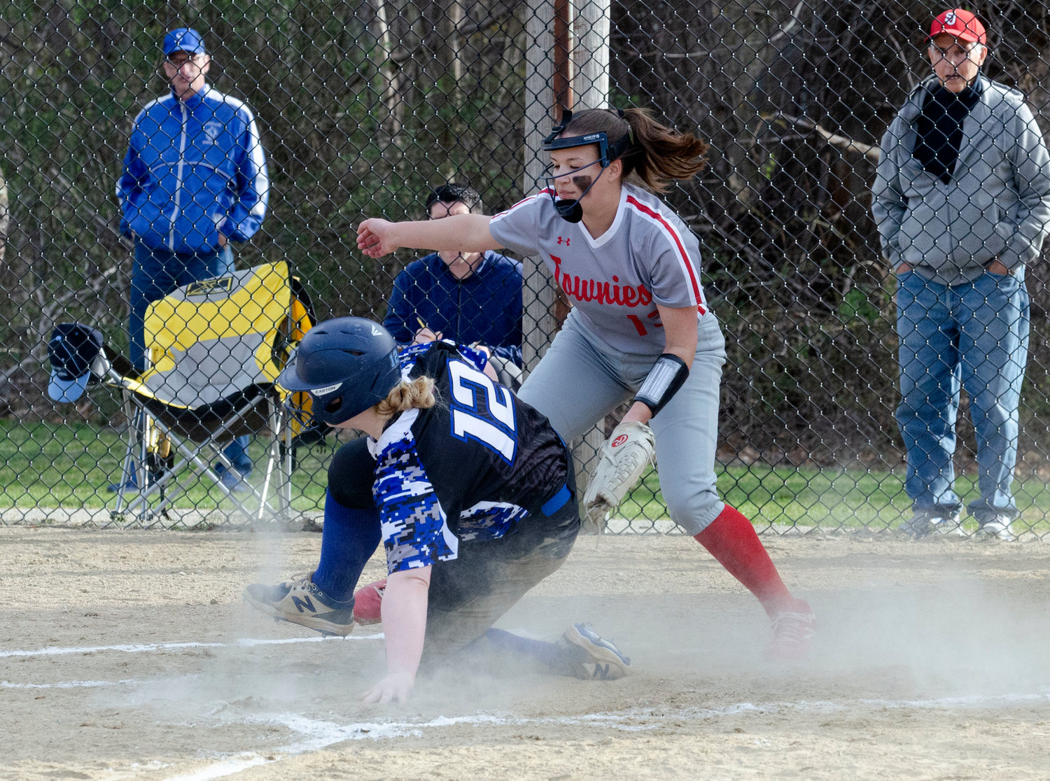 Quadros attempts to tag out a Scituate runner at home.