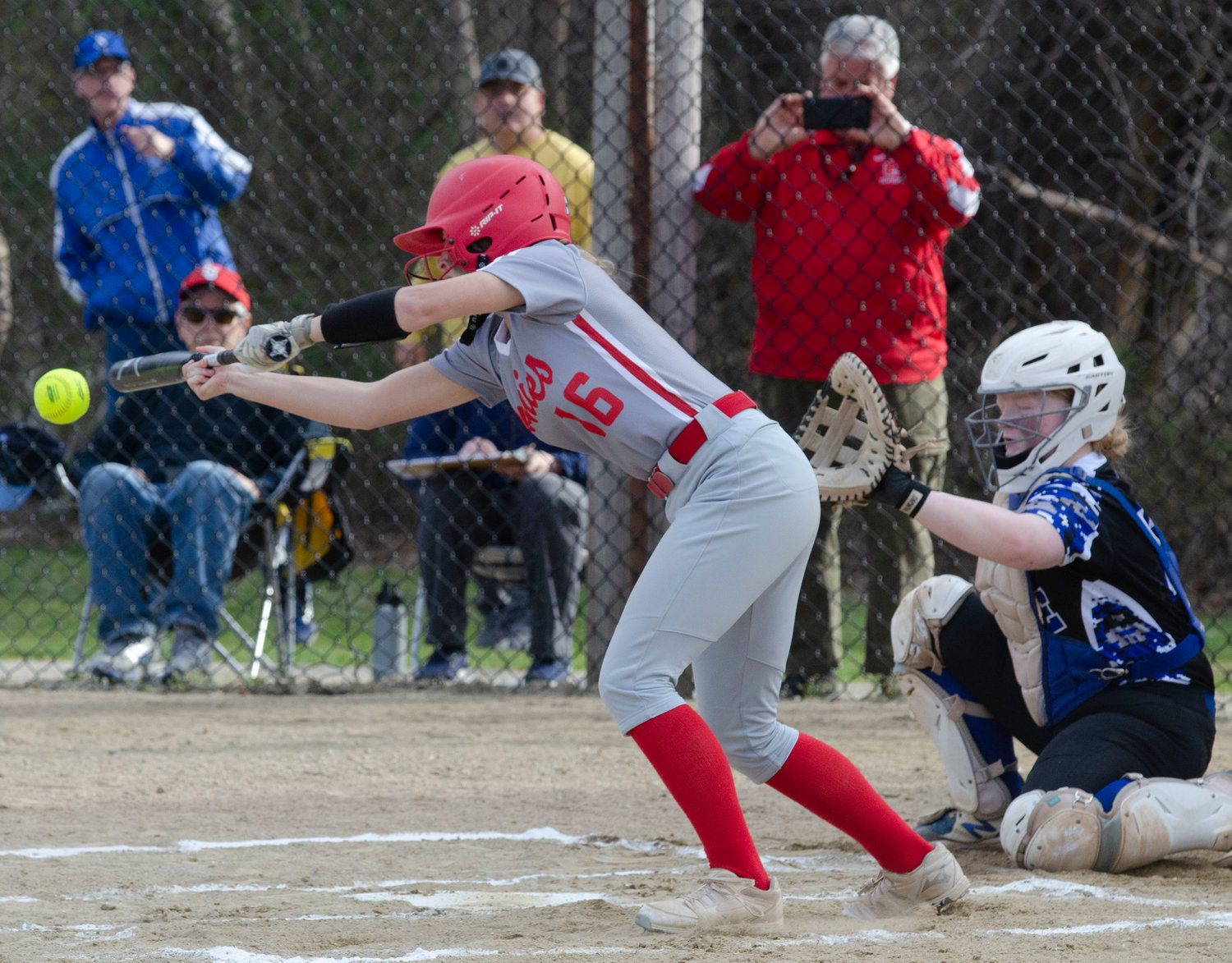 Ava Mendence attempts to bunt her way to first base.