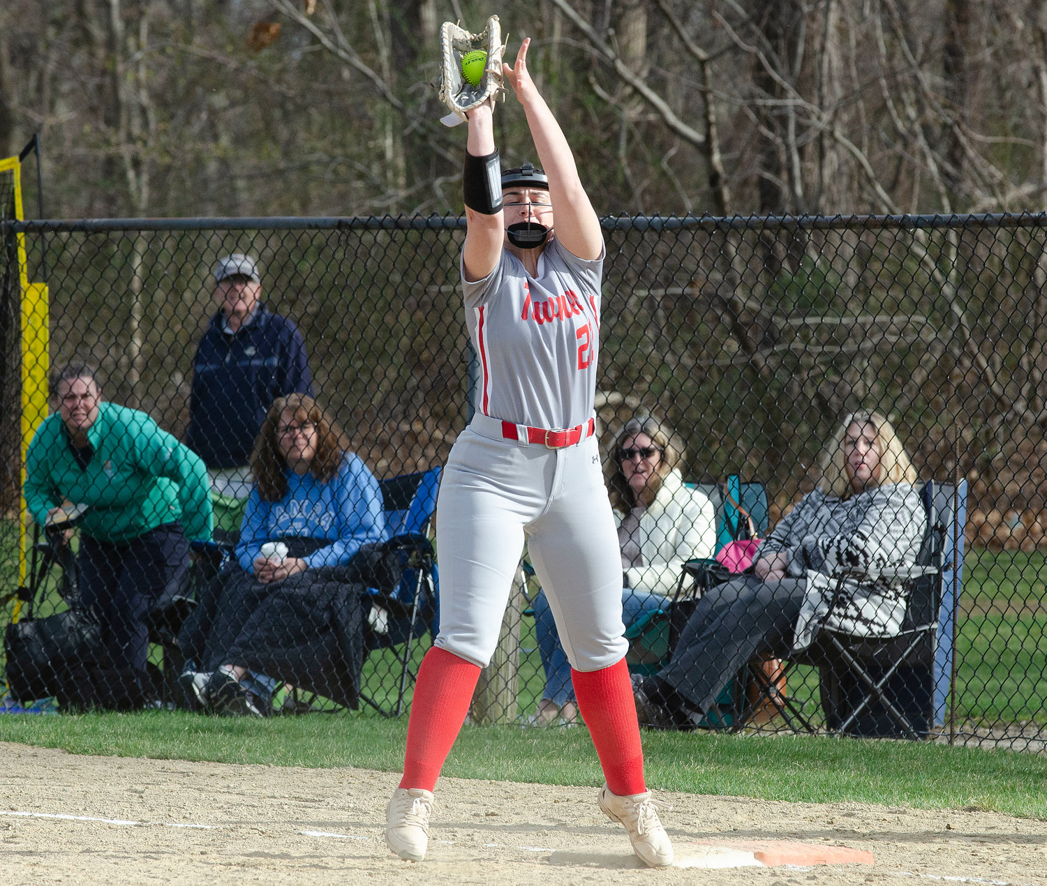 EPHS first baseman Emma Bergeron stretches to make a put-out for the Townies in their recent softball home outing against Scituate.
