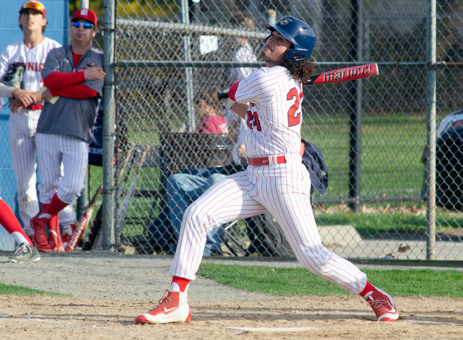 Elijah Barber watches his hit during the Townies game at Barrington on Wednesday, April 13.