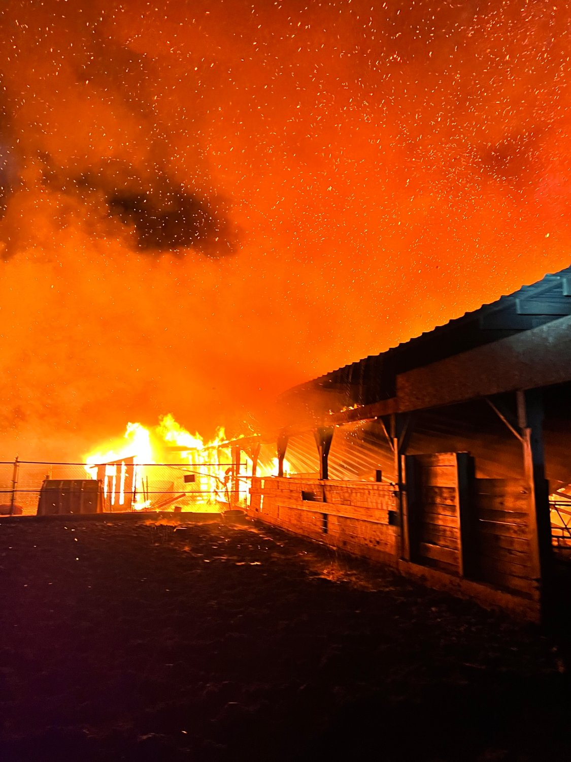 A barn seen fully ablaze on Barton Avenue in Touisset on Saturday night brought out around 40 Warren firefighters and apparatus from Swansea, Rehoboth, and Westport. No humans were injured in the fire.