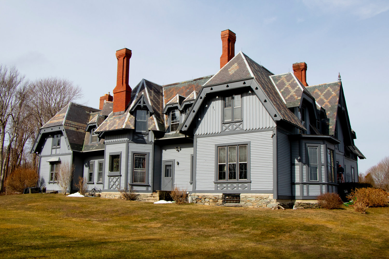 The owners of Greenvale Vineyards live in — and are renovating — a Gothic-style home built more than 150 years ago that is on the National Register of Historic Places. Its 12,000 square feet and 20 rooms enjoy a high perch overlooking the Sakonnet River.