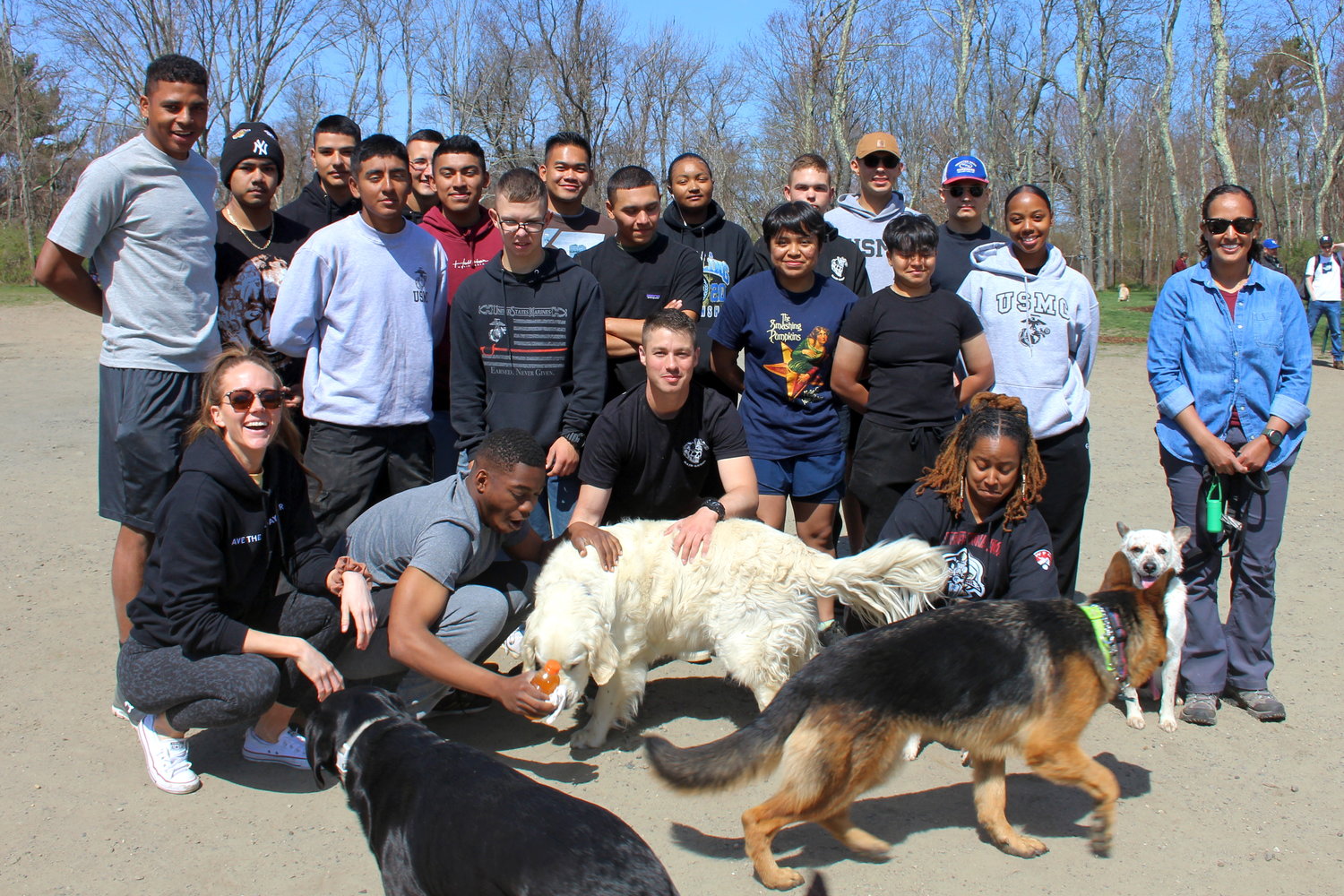 Nearly two dozen Marines from the Naval Justice School helped out during the cleanup at the Portsmouth Dog Park on Saturday.