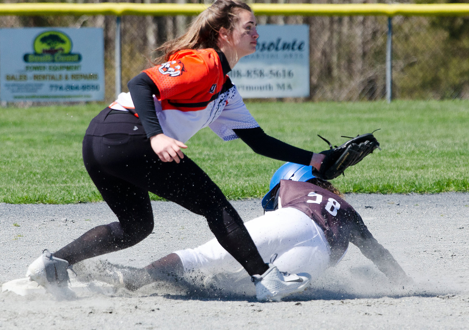Tess Silvia slides safely into second base for a steal.