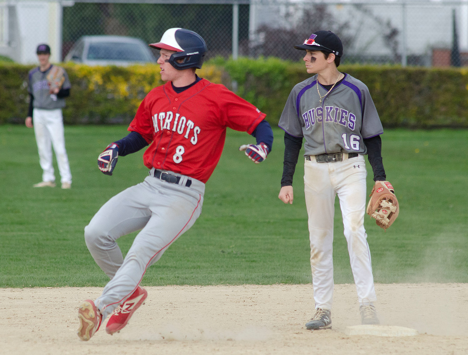 Owen Malone rounds second base after smacking a double during the game.