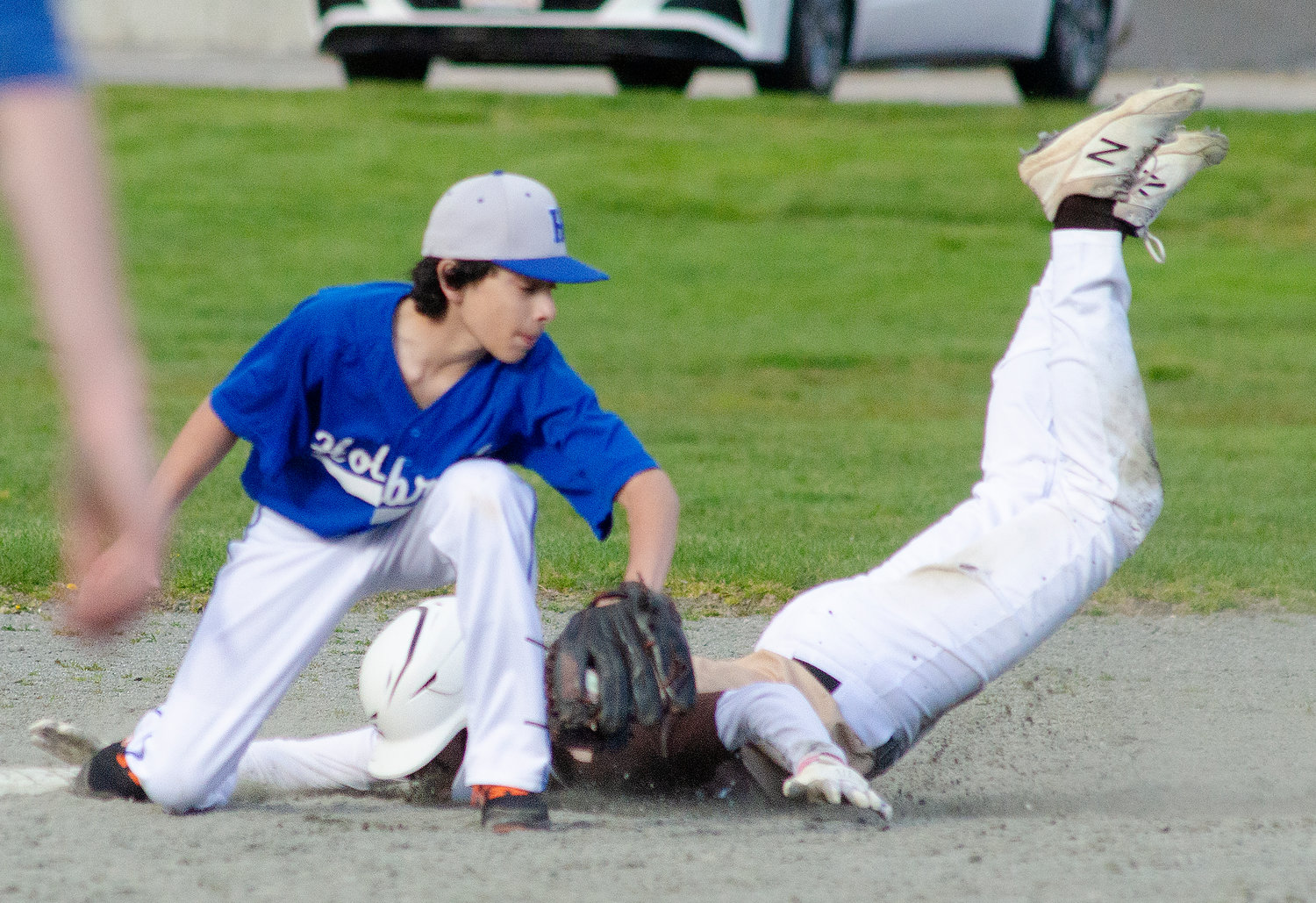 Cam Leary dives safely into second base for a stolen base in the first inning. Leary went 1 for 3 and scored two runs.