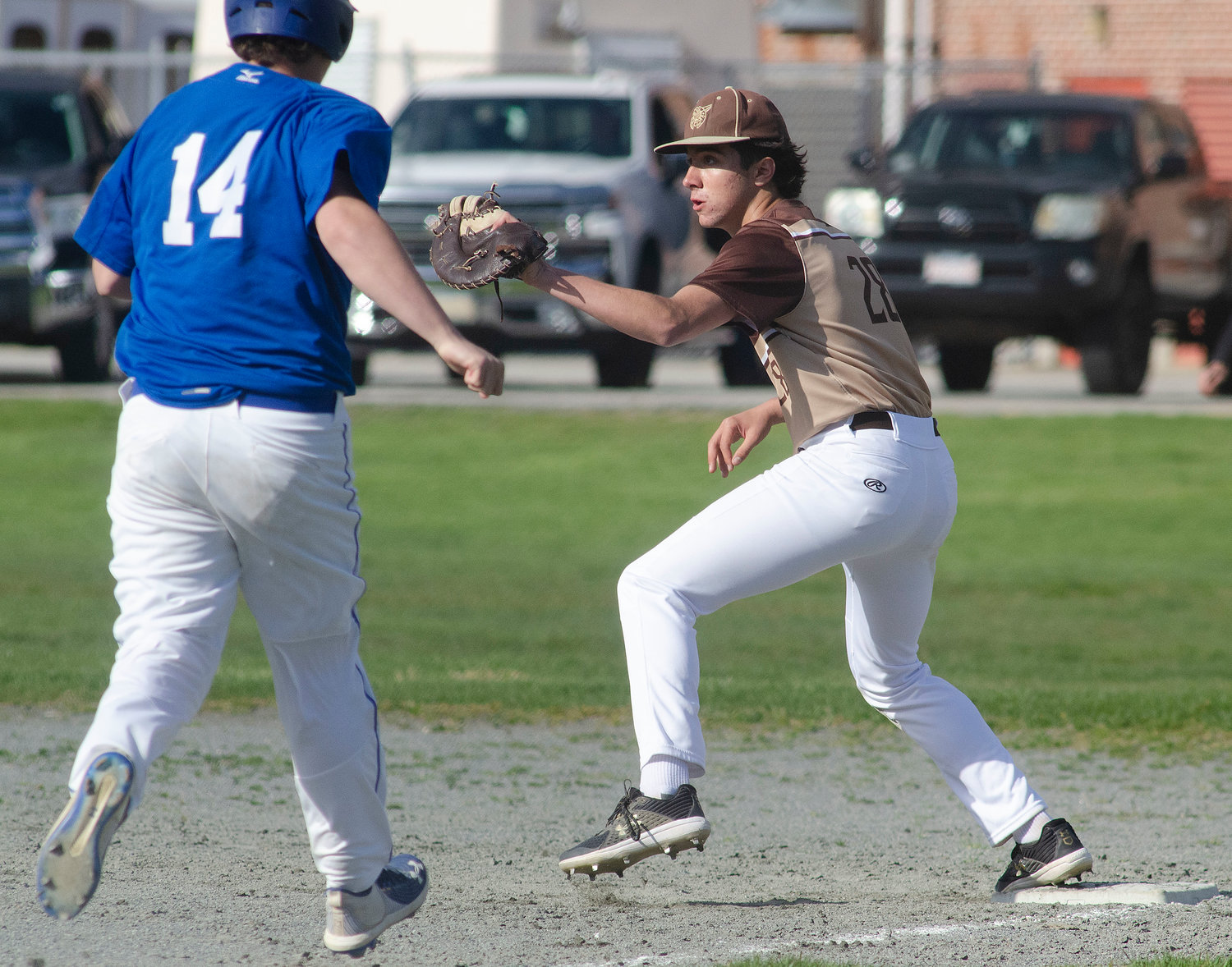 First baseman Max Morotti makes a catch at first to record an out during the team’s game against Holbrook. Offensively Morotti went 1 for 3 with a triple and 2 runs scored.