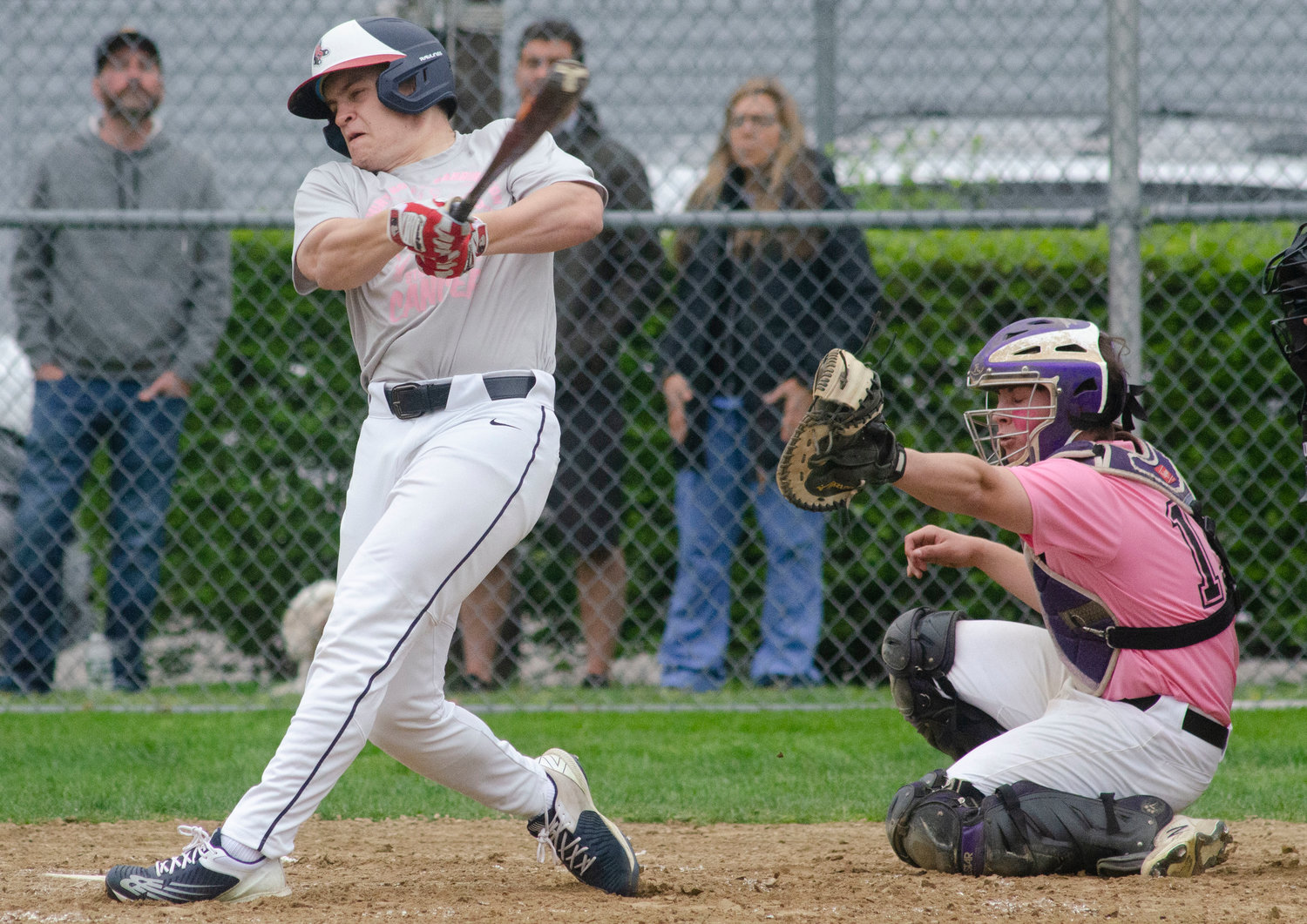 Barrington High School’s Harry Turner hits a long foul ball during the game against Mt. Hope on Friday.
