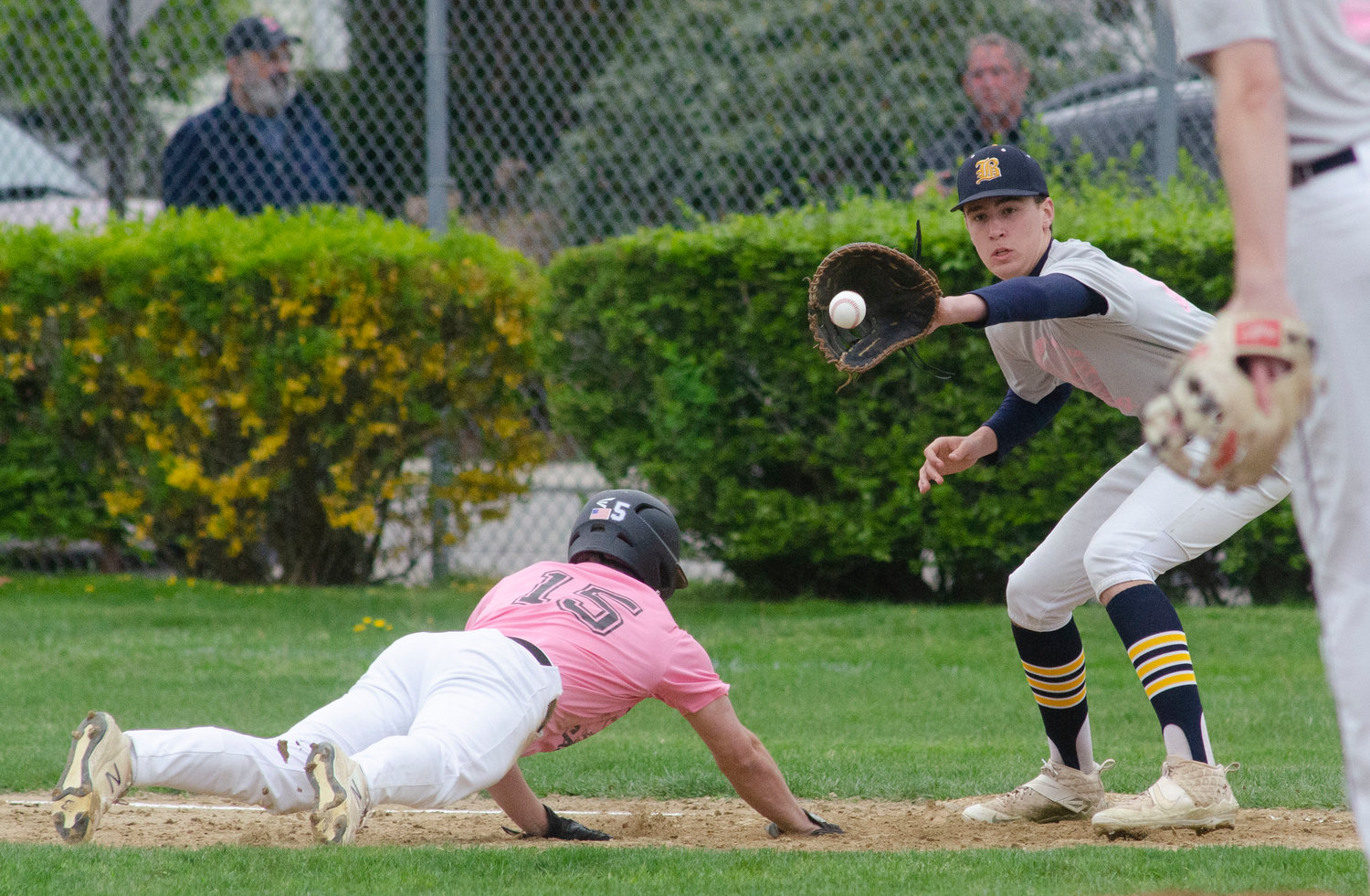 Eagles’ first baseman Nick Scandura stretches to catch a pick-off attempt from Harrison Cooley during a game against Mt. Hope on Friday. The two teams used the game as a fund-raiser for the Jimmy Fund, collecting more than $5,000 in donations.