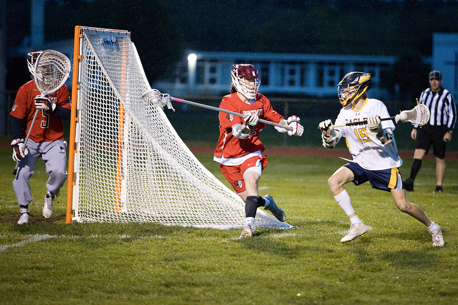Joe Rocco prevents a Barrington opponent from turning toward the goal.