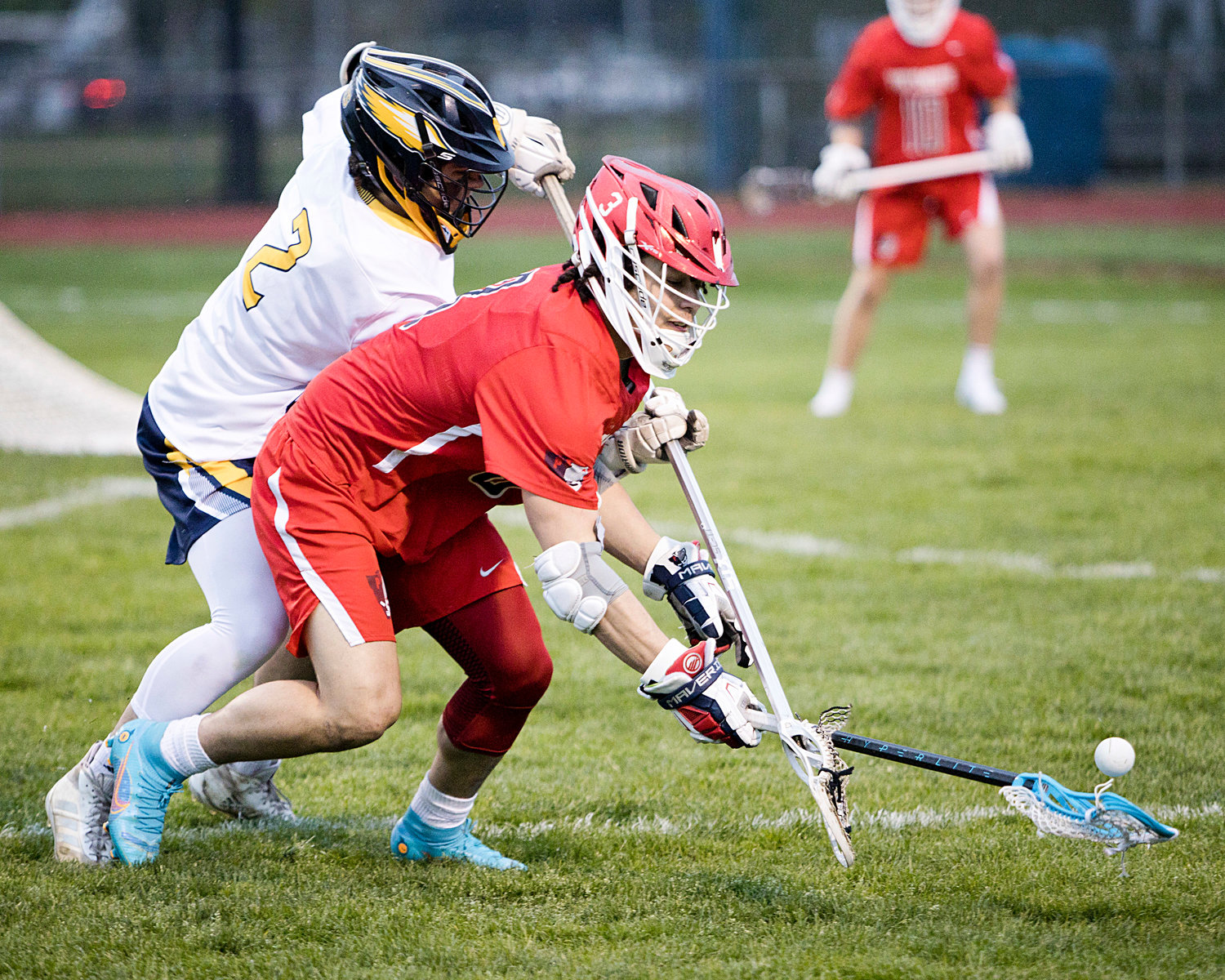 Marcus Evans battles a Barrington opponent for possession of a loose ball.
