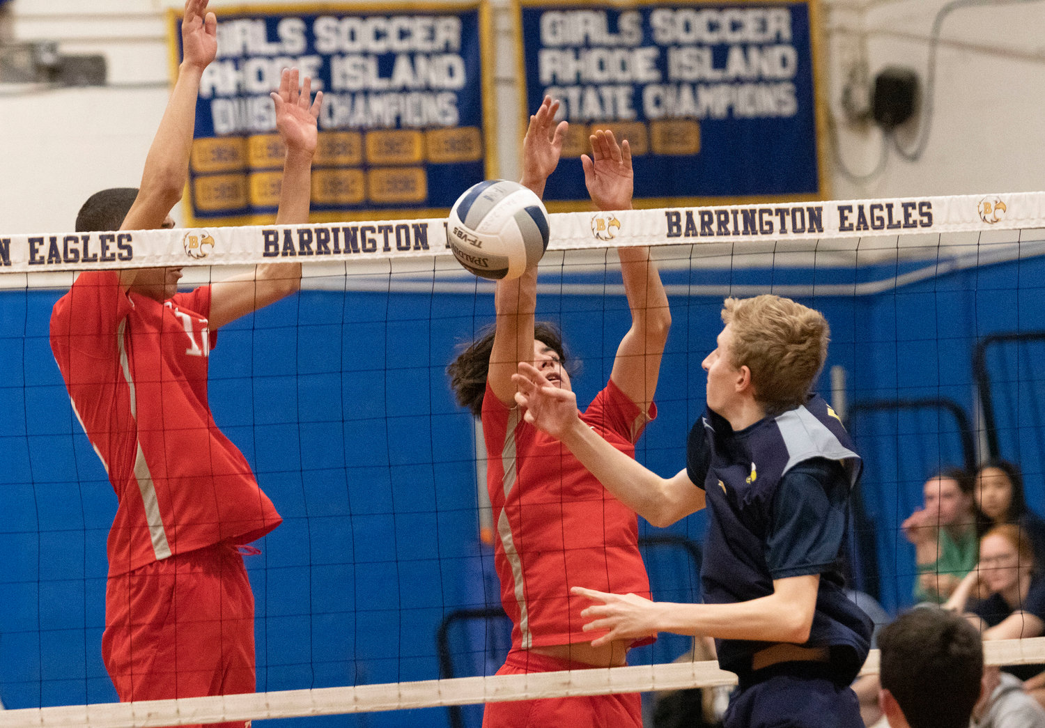 Townies Grant Wosencroft (left) and Brett Schwab block an Eagles shot during their match on Thursday night, May 5.