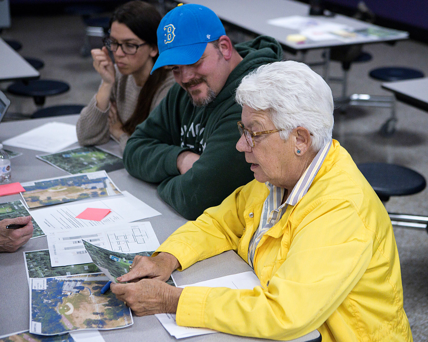 Peg Sampson (right) reviews a map of Burr's Hill with Bristol Park and Recreation's Tim Shaw while deciding on an ideal location for the Burr's Hill Park Activity Building.