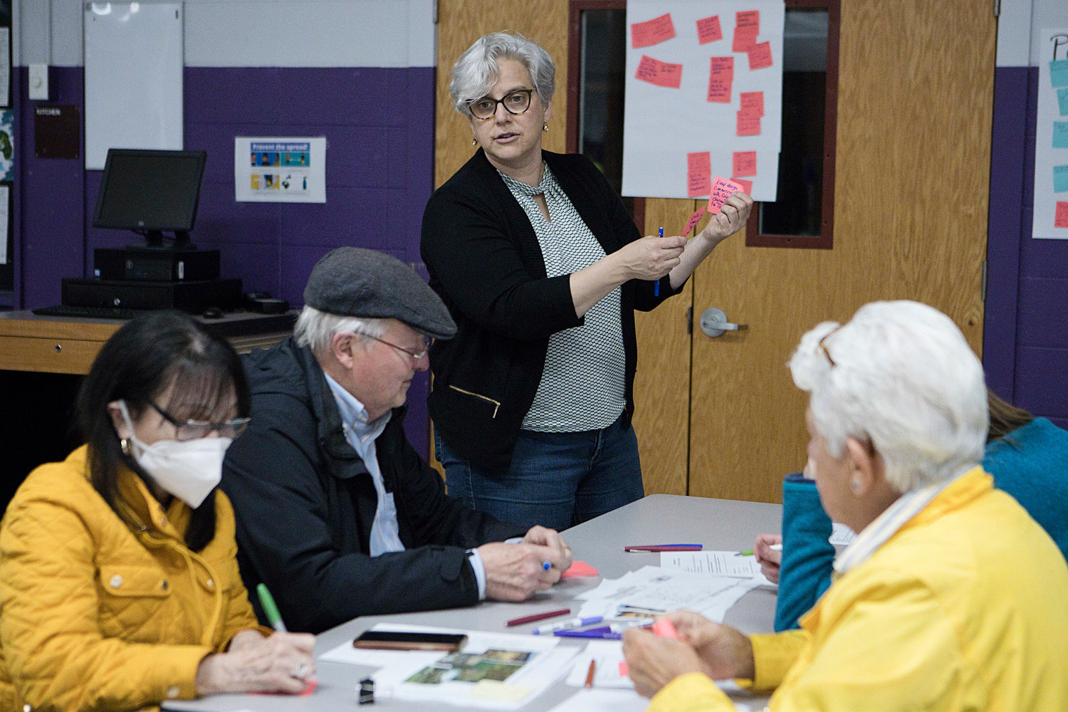 Kristin Read discusses design ideas with a group during the "Design Charette" for the Burr's Hill Park Activity Building last Wednesday.