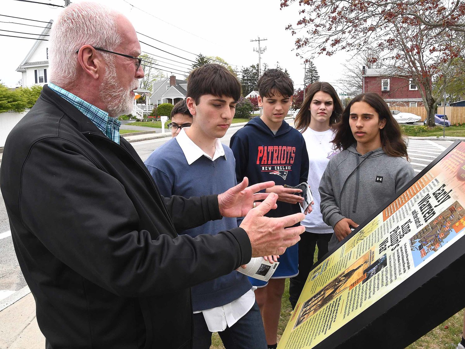 Kickemuit Middle School Principal Dennis Morrell explains some of the history of the location to students.