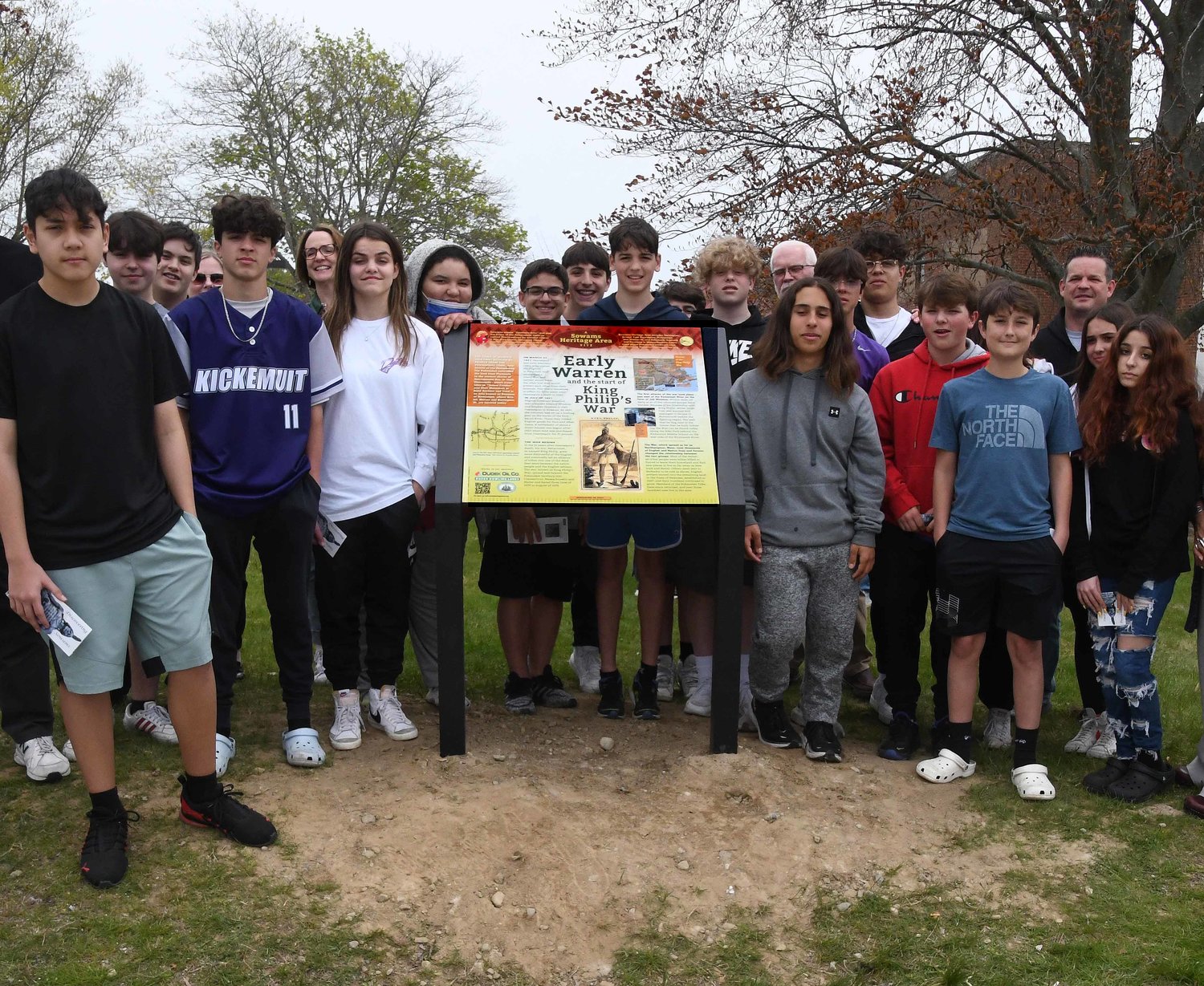 Students around the new marker