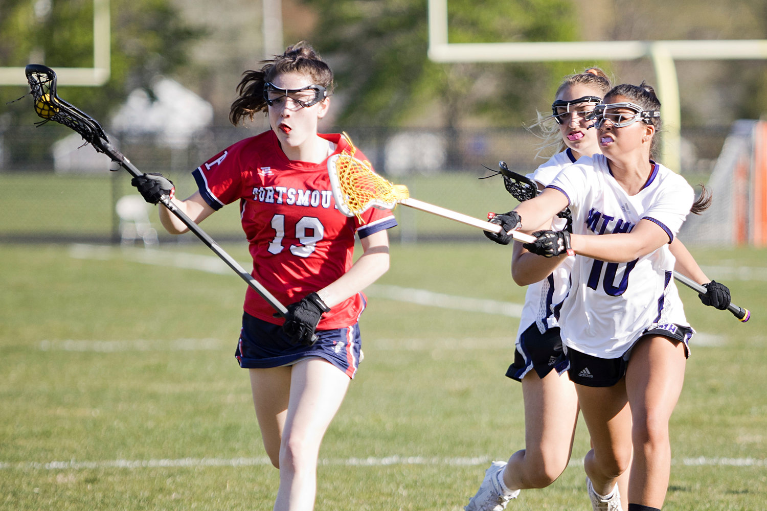 Nora Cooney is pressured by Mt. Hope's Isabelle Correira while  advancing the ball toward the goal.