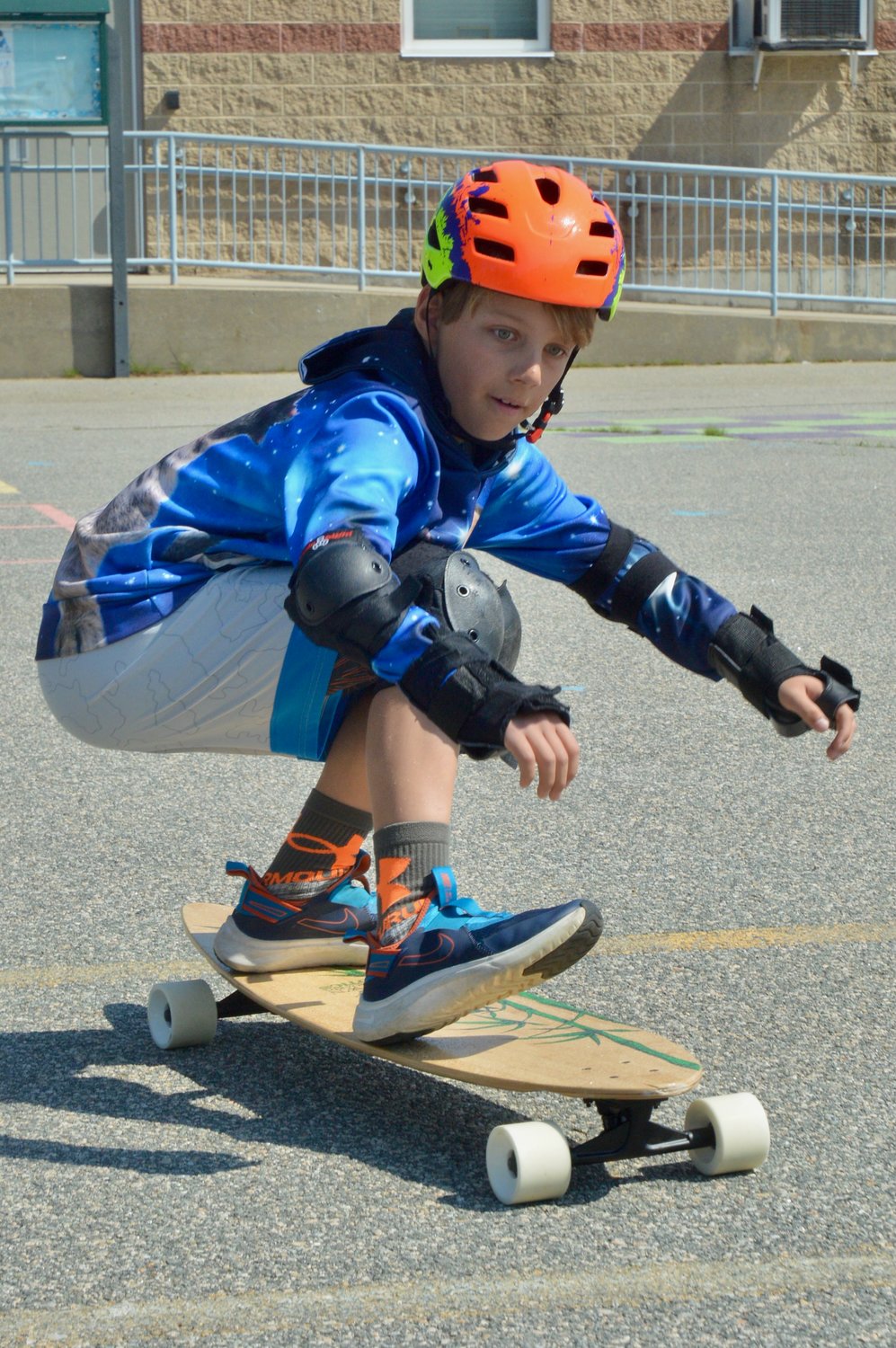 Colby, a fourth-grader at Melville School, proved to be one of the more advanced longboarders in Ryan Soares’s gym class on Monday, although the activity is ideal for all skill levels.