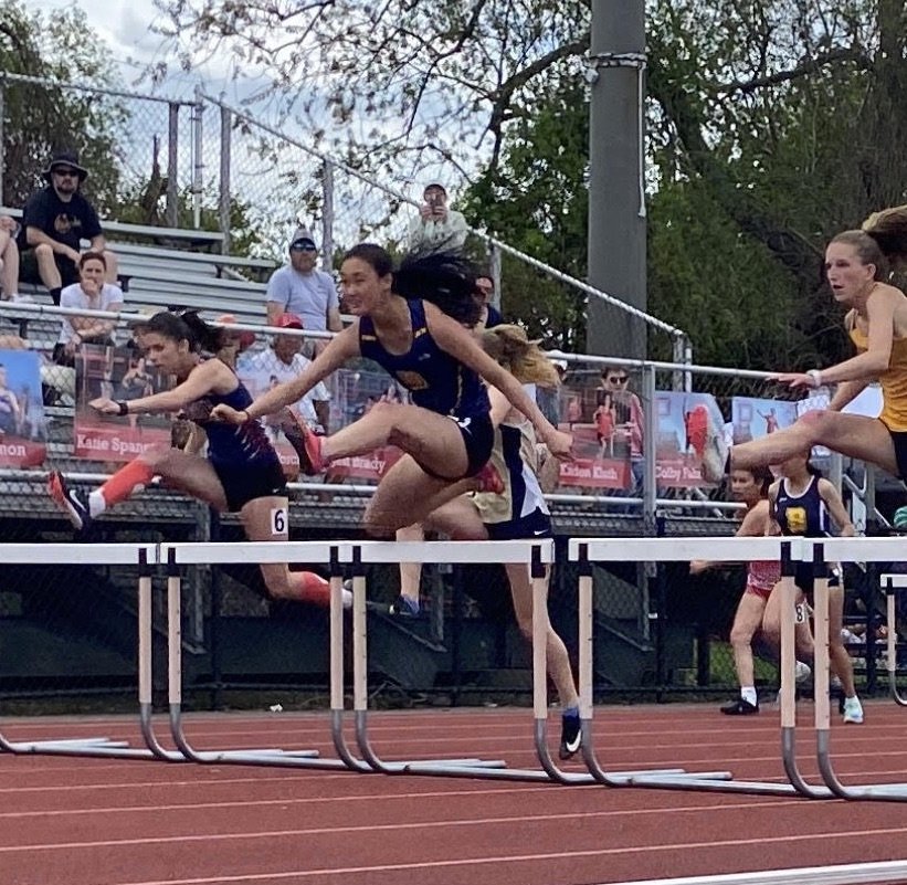 Senior tri-captain Grace Saal on her way to winning the girls 100-meter hurdles at the RI Eastern Division Track and Field Championships at Portsmouth High School.